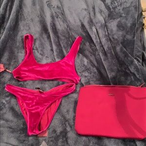 A purple velvet bikini. Large top medium bottom.